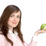 woman holding apple woman holding apple