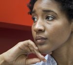 Woment is lookin to the right with an expression of concern Depression & Diabetic Retinopathy