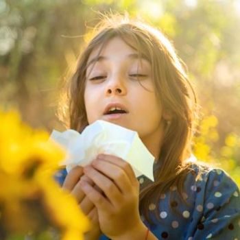 Sneezing and eye redness from seasonal allergy